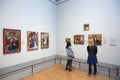 Women looking at National Gallery paintings in London