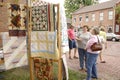 Women looking at quilts on display Royalty Free Stock Photo