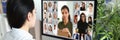 Woman looking at the display screen at the photo of people