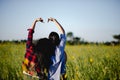 Young women love and fall in love with beautiful nature. And look forward happily, with a gesture of the forest love concept Royalty Free Stock Photo