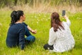 Women making photos with phone