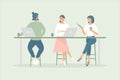 Women and man friends or colleagues sitting at desk in modern office or cafe,working at notebook and tablet,have coffee, talking. Royalty Free Stock Photo