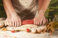 Women and men baker hands pasta butter cook tomato preparation dough and making bread Royalty Free Stock Photo