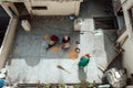 Women manual cleaning of grain from garbage in India