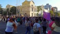 Purple feminism flag waving at International Women's Day 8M march, slow motion - Santiago, Chile - Mar 08, 2022