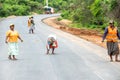Women measure road on construction site near Yala, Sri Lanka