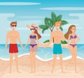 women and men in the beach with swimsuit and bathing shorts Royalty Free Stock Photo