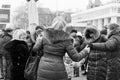 Women, men and children are dancing in the square in the center of Tiraspol, Moldova at the Shrovetide Festival