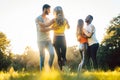 Women and men having fun dancing in the park Royalty Free Stock Photo