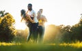 Women and men having fun dancing in the park Royalty Free Stock Photo