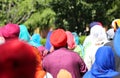 women and men parade with viels and turbans Royalty Free Stock Photo