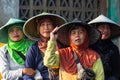 Women and men standing and waiting for the fishing boats Royalty Free Stock Photo