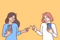 Women with mobile phones point fingers at each other, rejoicing at first meeting Royalty Free Stock Photo