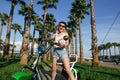 Women with modern city electric e-bike clean sustainable urban transportation