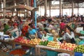 Business women are active with selling tropical fruits at the indoor market, Vientiane, Laos