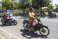 Women on motorbike, Bali