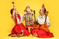 Women musicians in Russian folk dresses with musical instruments o Royalty Free Stock Photo