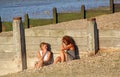 Women nattering on beach