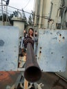 Women with Navy Battle Ship Gun Royalty Free Stock Photo