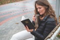 Women in outdoors reading Bible. Concept for faith, spirituality and religion