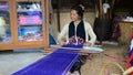 Women Pa-Ka-Geh-Yor (Karen Sgaw) was weaving.
