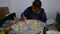 Delores Hidalgo, Mexico-January 10, 2017: Women painting pottery