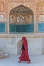 Women passing from the Sheesh Mahal gate, Amber Palace, Jaipur, Rajasthan