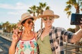 Women, peace selfie and holiday smile in Miami with happiness from summer travel and vacation. Beach, web connection and Royalty Free Stock Photo