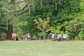 Women pensioners rest in city park. Elderly women enjoy vacation in country