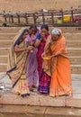 Women performing a Hindu ritual at the Ganges river in Varanasi Royalty Free Stock Photo