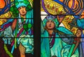 Women personifying the Czech and Slovakian peoples on the stained-glass window designed by Alphonse Mucha in St. Vitus Cathedral