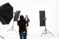 Women photographers are shooting Asian pretty women in the studio