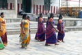 Women pilgrims in colorful sarees in the Shiva Nataraja temple