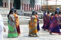 Women pilgrims in colorful sarees in the Shiva Nataraja temple