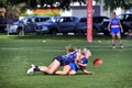 Women playing Australian Rules Football (WAFL