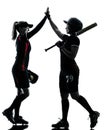 Women playing softball players silhouette isolated Royalty Free Stock Photo