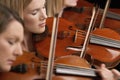 Women Playing Violins