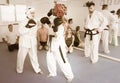 Women practicing at taekwondo class Royalty Free Stock Photo