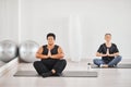 Women practicing yoga in class Royalty Free Stock Photo
