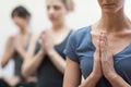 Women practicing yoga and meditation