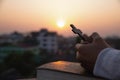 Women pray to God with the Bible and the cross with morning sunrise. Woman Pray for god blessing to wishing have a better life.