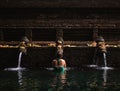 Woman Performing Water Purification Ceremony