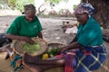 Women preparing food for the charity workers and the children