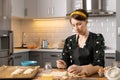 Women preparing homemade food pie, pizza in a cozzy kitchen. Hobbies and family life concept Royalty Free Stock Photo