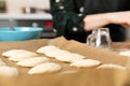 Women preparing homemade food pie, pizza in a cozzy kitchen. Hobbies and family life concept Royalty Free Stock Photo