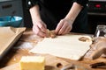 Women preparing homemade food pie, pizza in a cozzy kitchen. Hobbies and family life concept Royalty Free Stock Photo