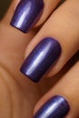 Women purple nail design close up