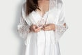 Women put on white nightgown