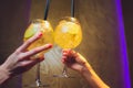 women raising a glasses of aperol spritz at the dinner table. Royalty Free Stock Photo