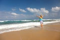 Women raising her hands on the beach Royalty Free Stock Photo